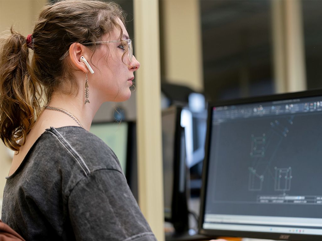 A student in a computer aided design class.