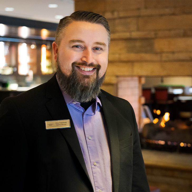 A person working at a hotel.