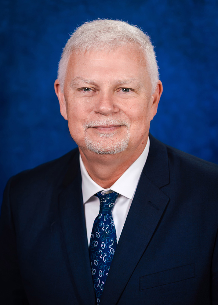 A portrait of Tom Sewell