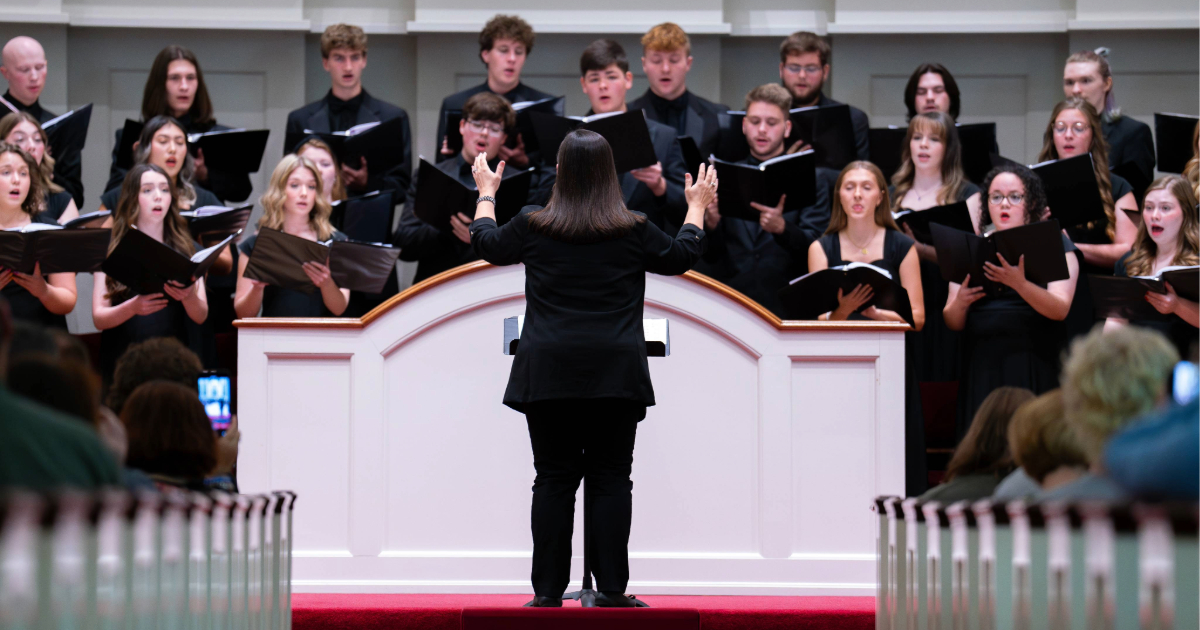 A choir concert with students singing.