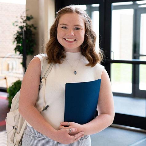 A student smiling 