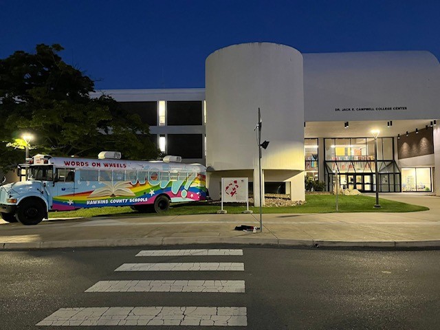 Book bus at night in front of CCEN